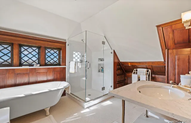 a bedroom with double bed and a window