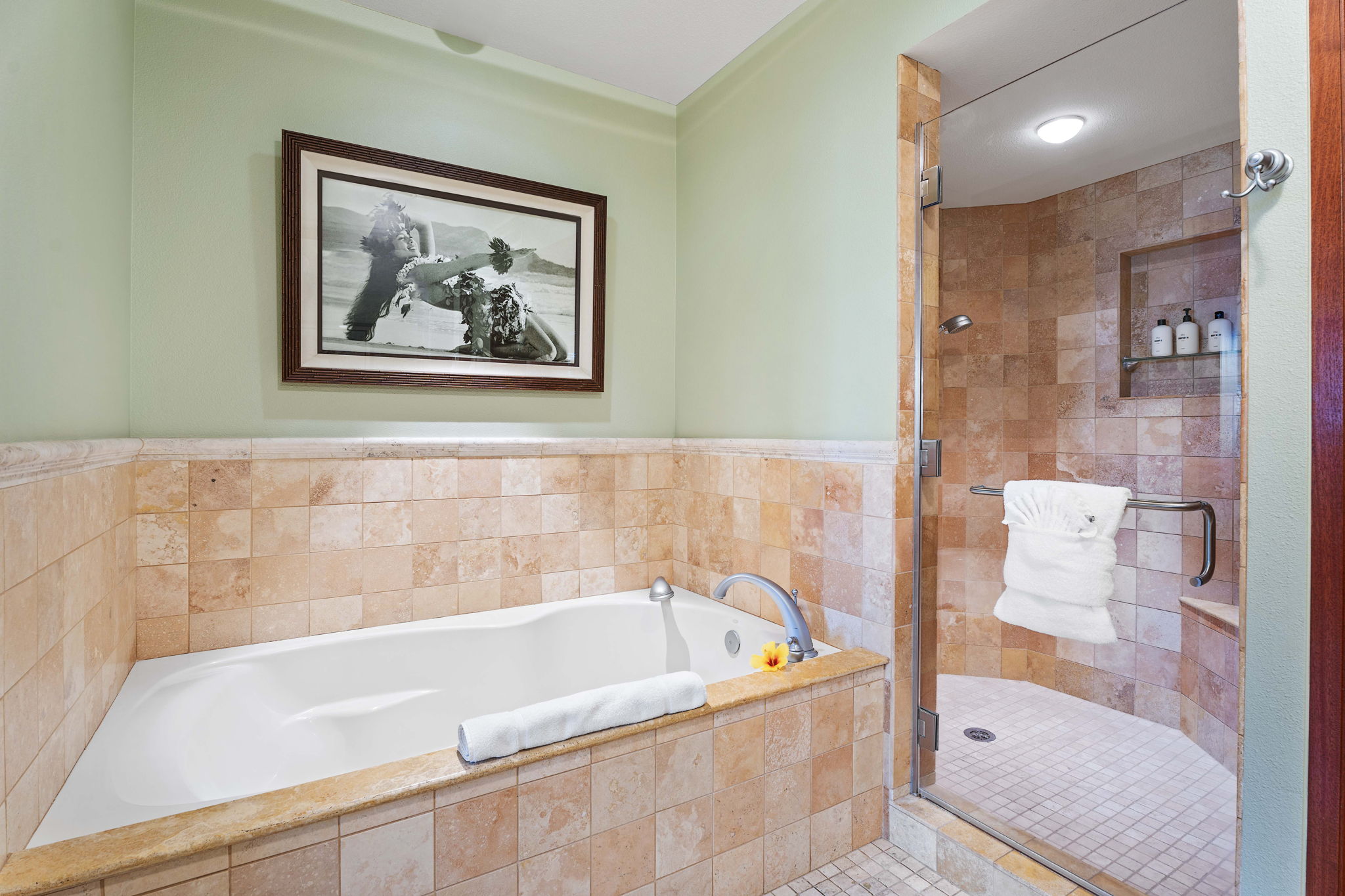 69-1000 Kolea Kai Circle, Unit 15L Waikoloa, HI 96738 - Photo 20 of 29 a bathroom with a bathtub and a shower
