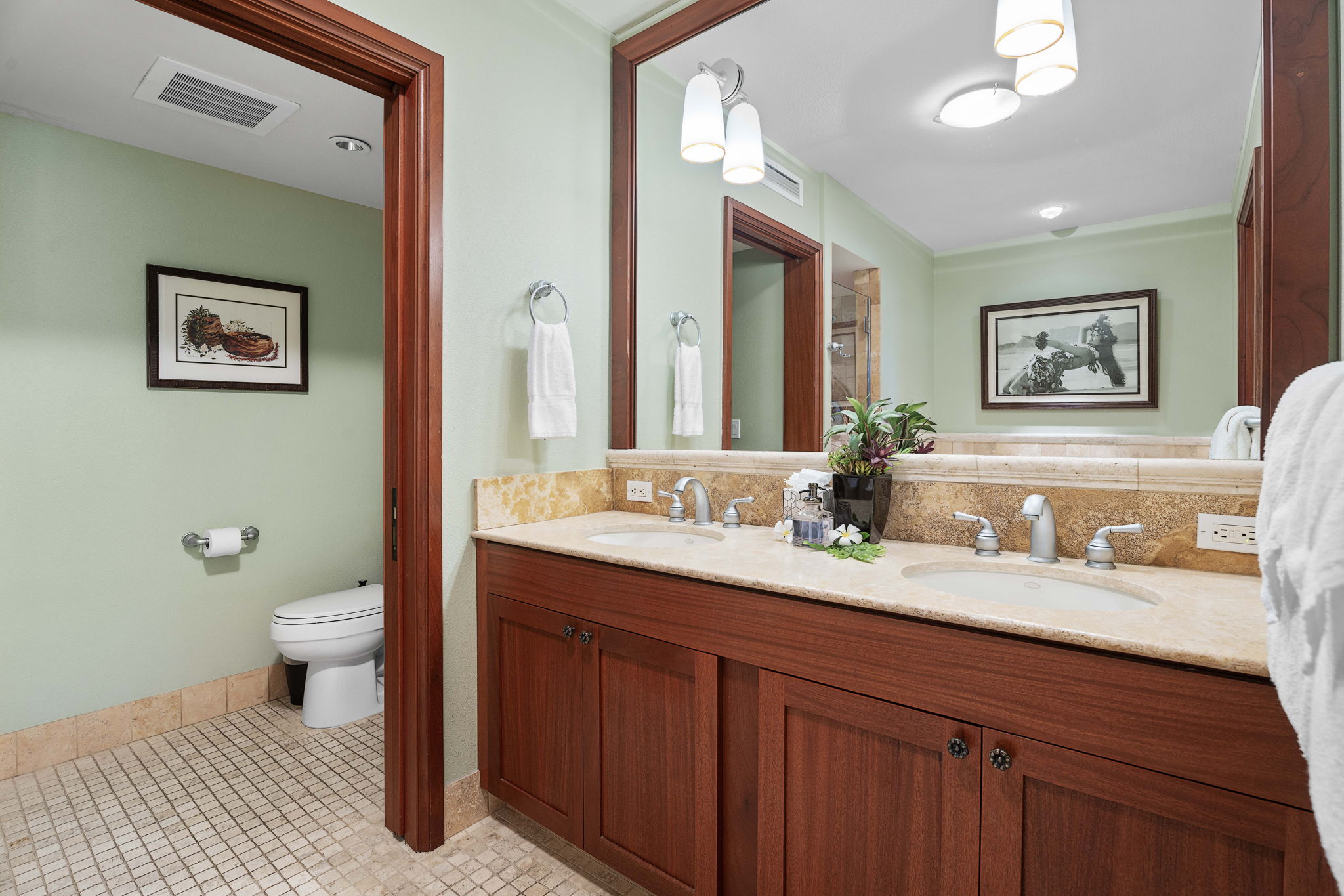 69-1000 Kolea Kai Circle, Unit 15L Waikoloa, HI 96738 - Photo 21 of 29 a bathroom with a granite countertop sink mirror and toilet