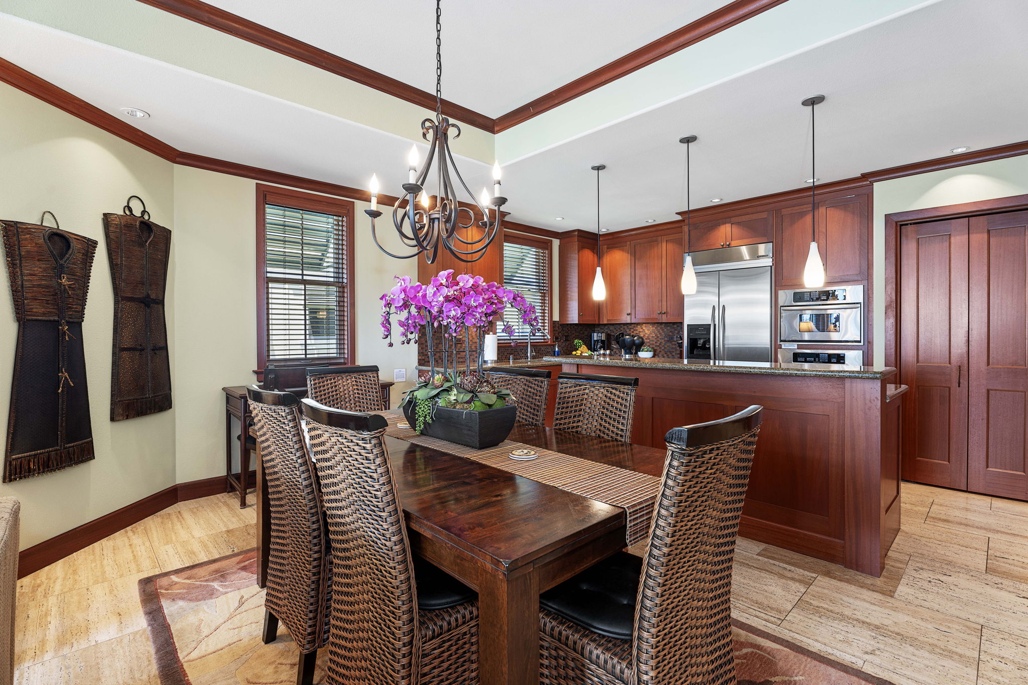 69-1000 Kolea Kai Circle, Unit 15L Waikoloa, HI 96738 - Photo 9 of 29 a view of a dining room with furniture