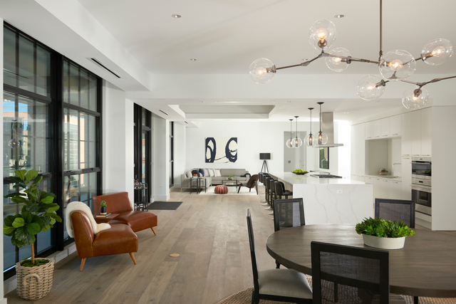 351 West Huron Street, Unit 4 Chicago, IL 60654 - Photo 11 of 30 a living room with furniture kitchen view and a large window
