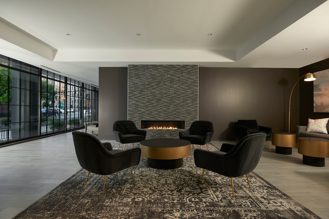 351 West Huron Street, Unit 4 Chicago, IL 60654 - Photo 3 of 30 a living room with furniture and a flat screen tv