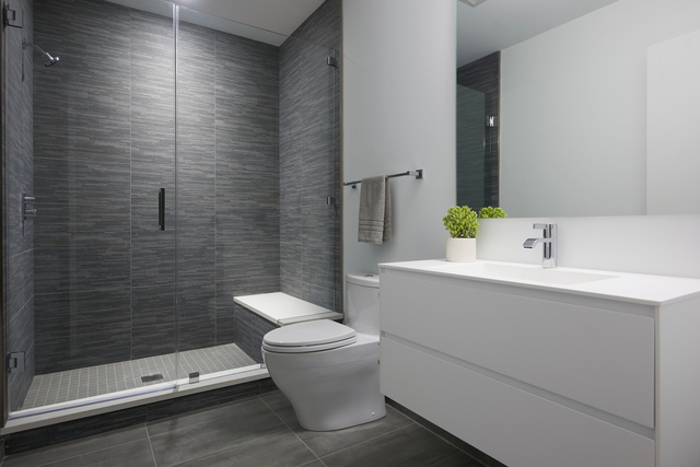 351 West Huron Street, Unit 4 Chicago, IL 60654 - Photo 26 of 30 a bathroom with a sink a toilet and shower