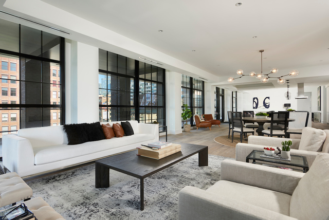 351 West Huron Street, Unit 4 Chicago, IL 60654 - Photo 6 of 30 a living room with furniture and a table