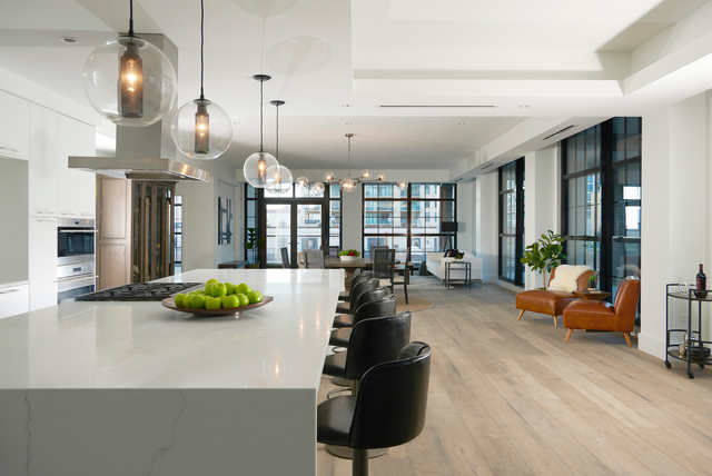 351 West Huron Street, Unit 4 Chicago, IL 60654 - Photo 8 of 30 a lobby with furniture and floor to ceiling window