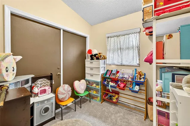 a view of a big yard with an trees