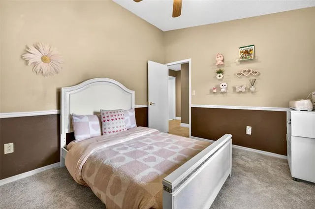 a view of a green field with lots of bushes