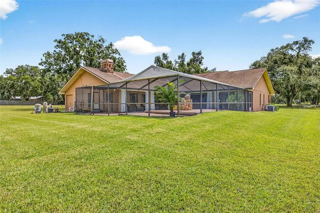 a kitchen with stainless steel appliances a refrigerator stove and microwave