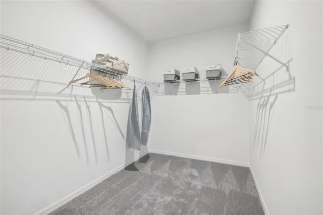 a view of a room with white walls