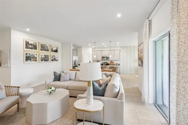 a living room with furniture and a table