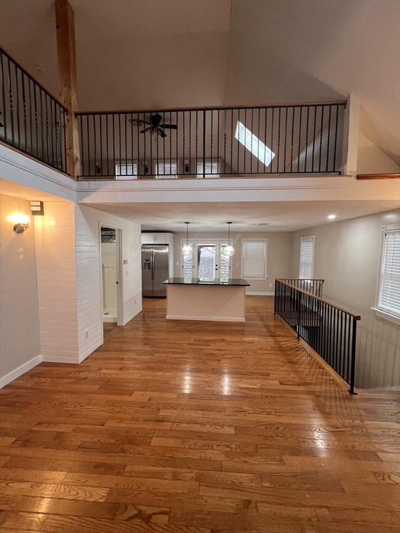 584 Wareham Street Middleboro, MA 02346 - Photo 2 of 10 a view of an empty room with wooden floor