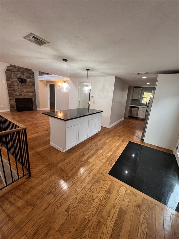584 Wareham Street Middleboro, MA 02346 - Photo 3 of 10 a living room with furniture and a flat screen tv