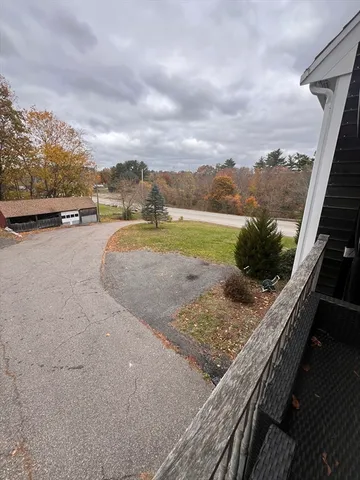 a view of swimming pool from a balcony