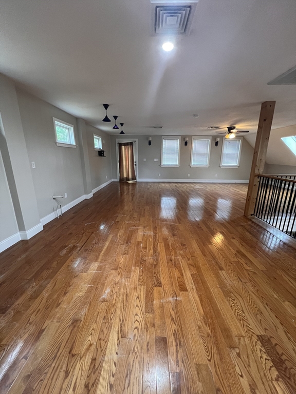 584 Wareham Street Middleboro, MA 02346 - Photo 9 of 10 a view of a livingroom with wooden floor