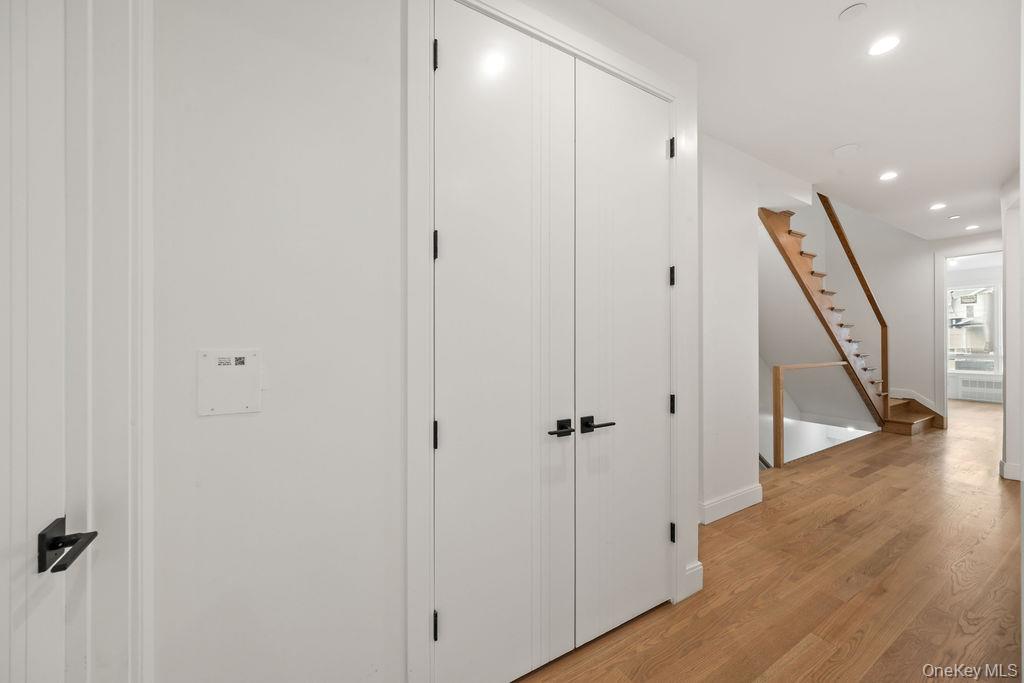 62 Blauvelt Road, Unit 202 Monsey, NY 10952 - Photo 5 of 34 a view of a hallway with wooden floor and staircase