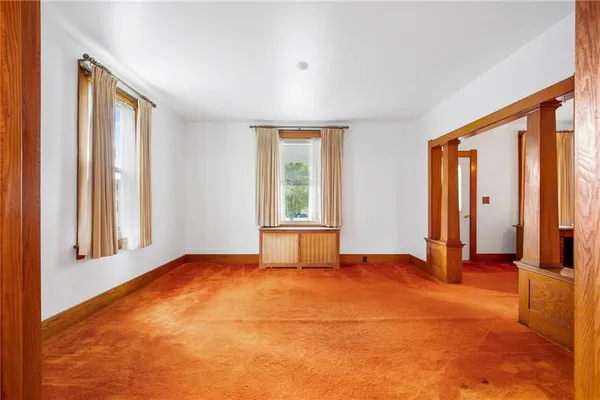 an empty room with windows
