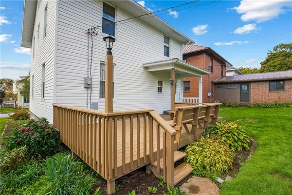 a view of a house with a big yard