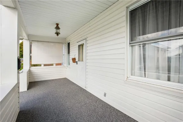a view of a livingroom with a furniture