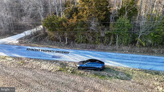 a view of a bench in a backyard