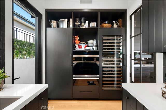 a kitchen with appliances and cabinets