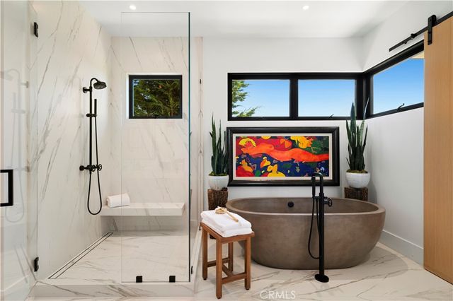 a living room with lots of furniture and closet