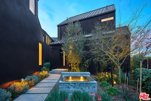 a front view of house with a yard