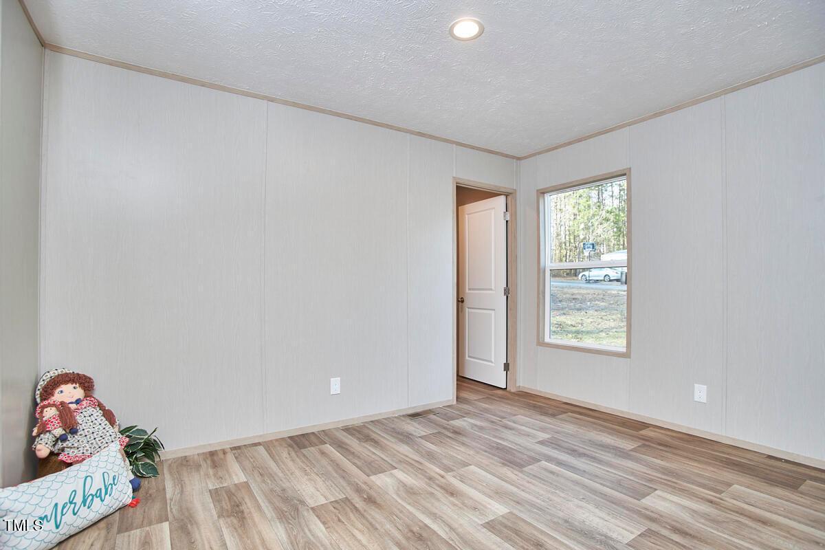 48 Bone Oak Sanford, NC 27332 - Photo 18 of 21 a view of a livingroom with a window