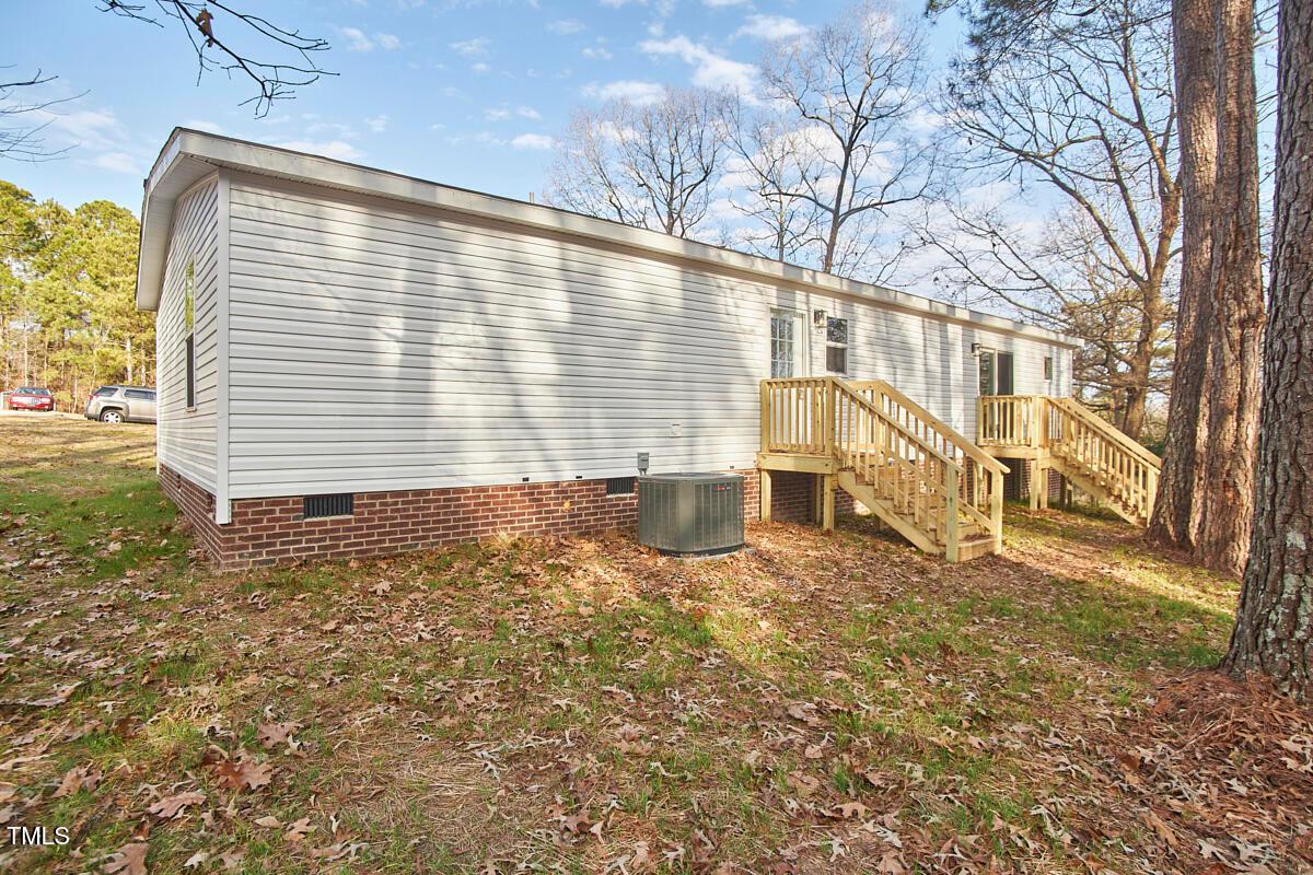 48 Bone Oak Sanford, NC 27332 - Photo 3 of 21 a view of a house with a yard
