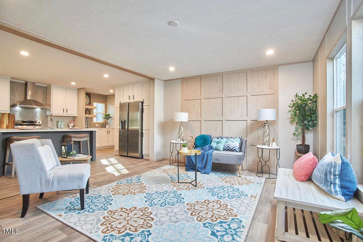 48 Bone Oak Sanford, NC 27332 - Photo 6 of 21 a living room with furniture and kitchen view