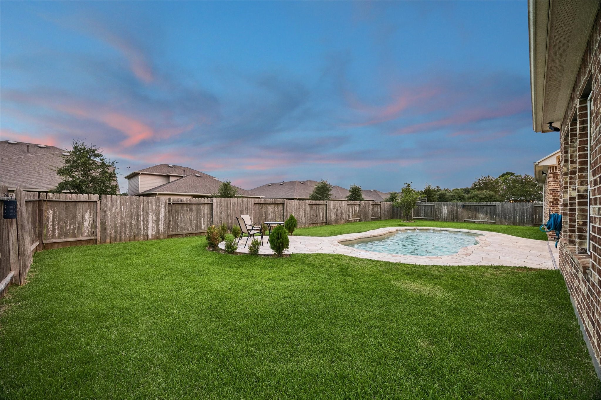 3306 Explorer Way Conroe, TX 77301 - Photo 27 of 35 Enjoy summer days in this spectacular backyard with a pool!