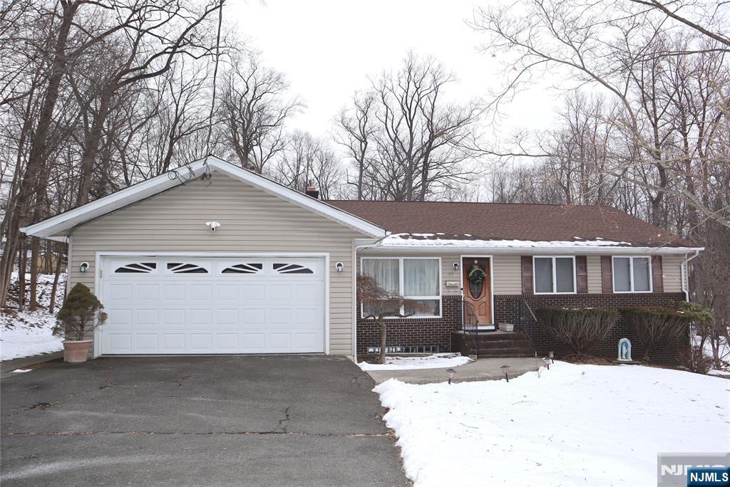 a view of a house covered in snow