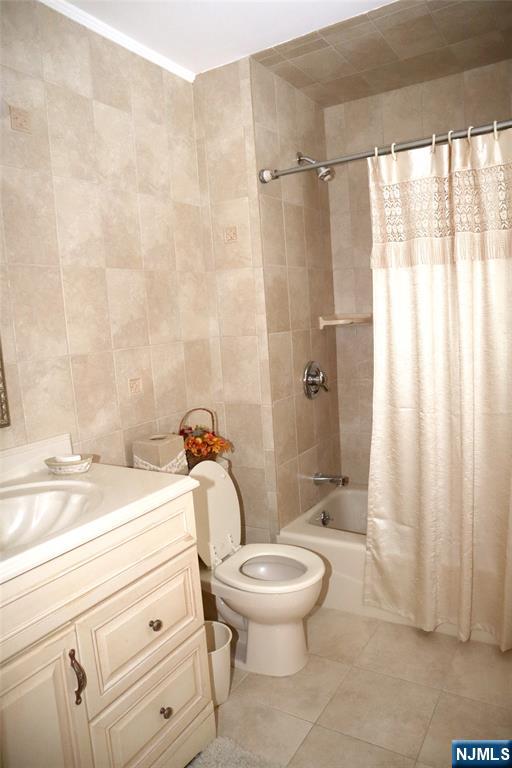 97 Squaw Brook Road North Haledon, NJ 07508 - Photo 12 of 19 a bathroom with a sink a toilet and shower