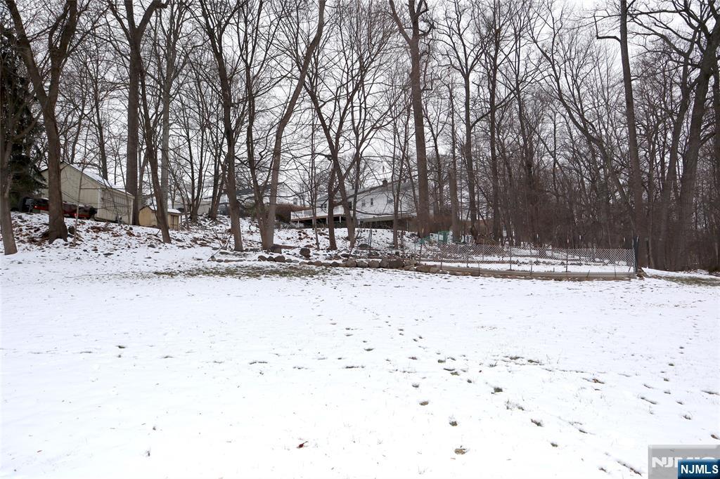 97 Squaw Brook Road North Haledon, NJ 07508 - Photo 3 of 19 a view of snow on the road