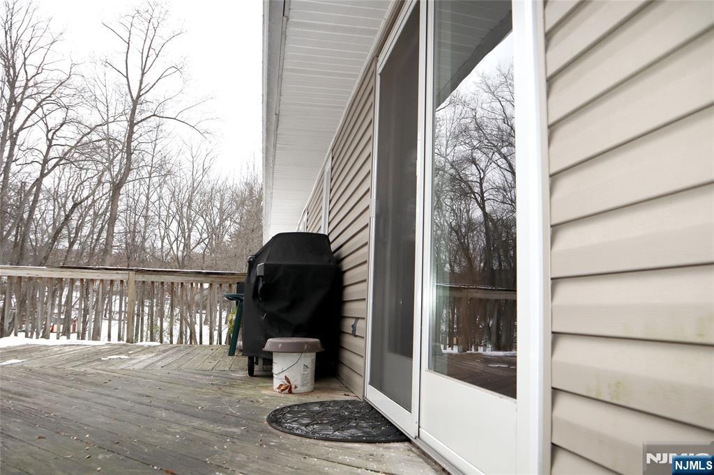 97 Squaw Brook Road North Haledon, NJ 07508 - Photo 4 of 19 a view of entryway with a balcony and wooden floor