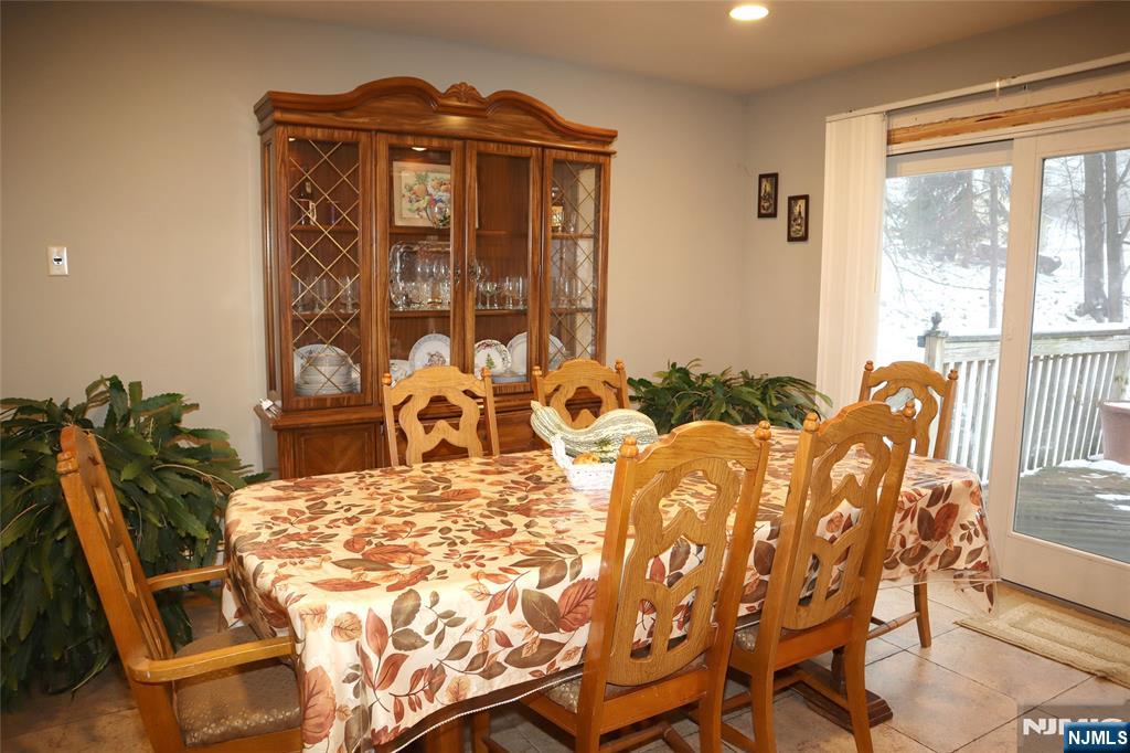 97 Squaw Brook Road North Haledon, NJ 07508 - Photo 9 of 19 a view of a dining room with furniture window and outside view
