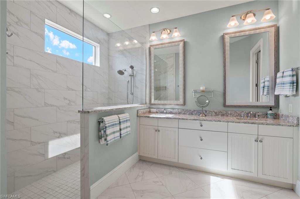 6420 Pembroke Way Naples, FL 34113 - Photo 16 of 39 Master Bathroom featuring a step in shower