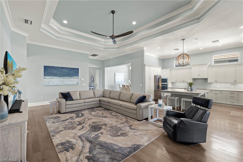 6420 Pembroke Way Naples, FL 34113 - Photo 3 of 39 This shot shows both the dining room and kitchen locations