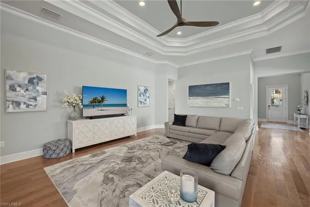 a large kitchen with a table and chairs