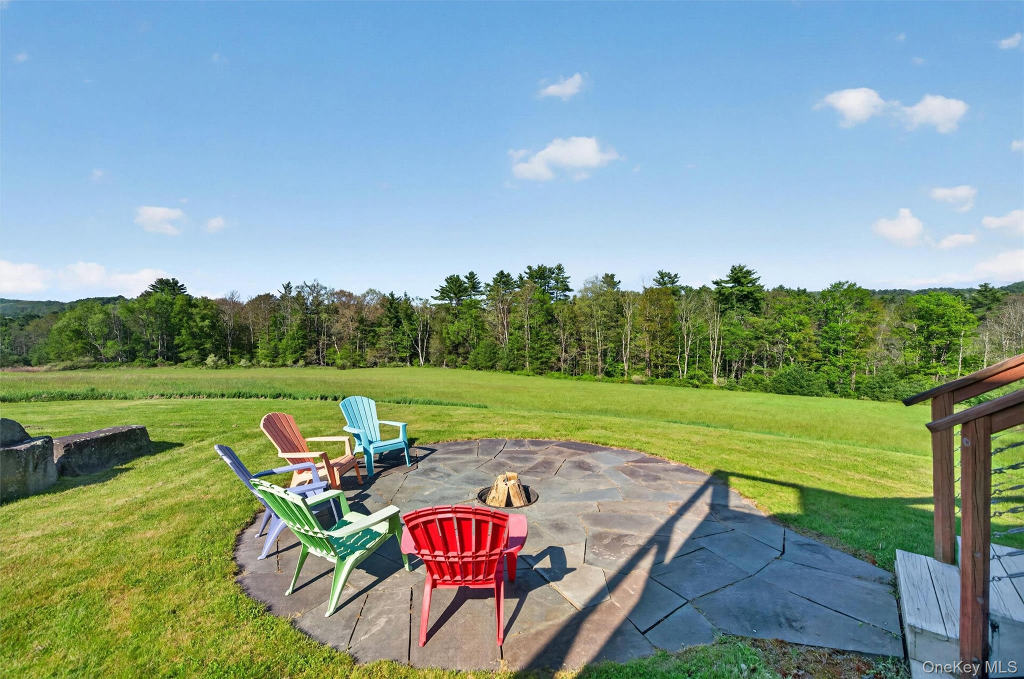 340 Hospital Road Callicoon, NY 12723 - Photo 20 of 41 a view of a swimming pool and lounge chairs in back yard of the house