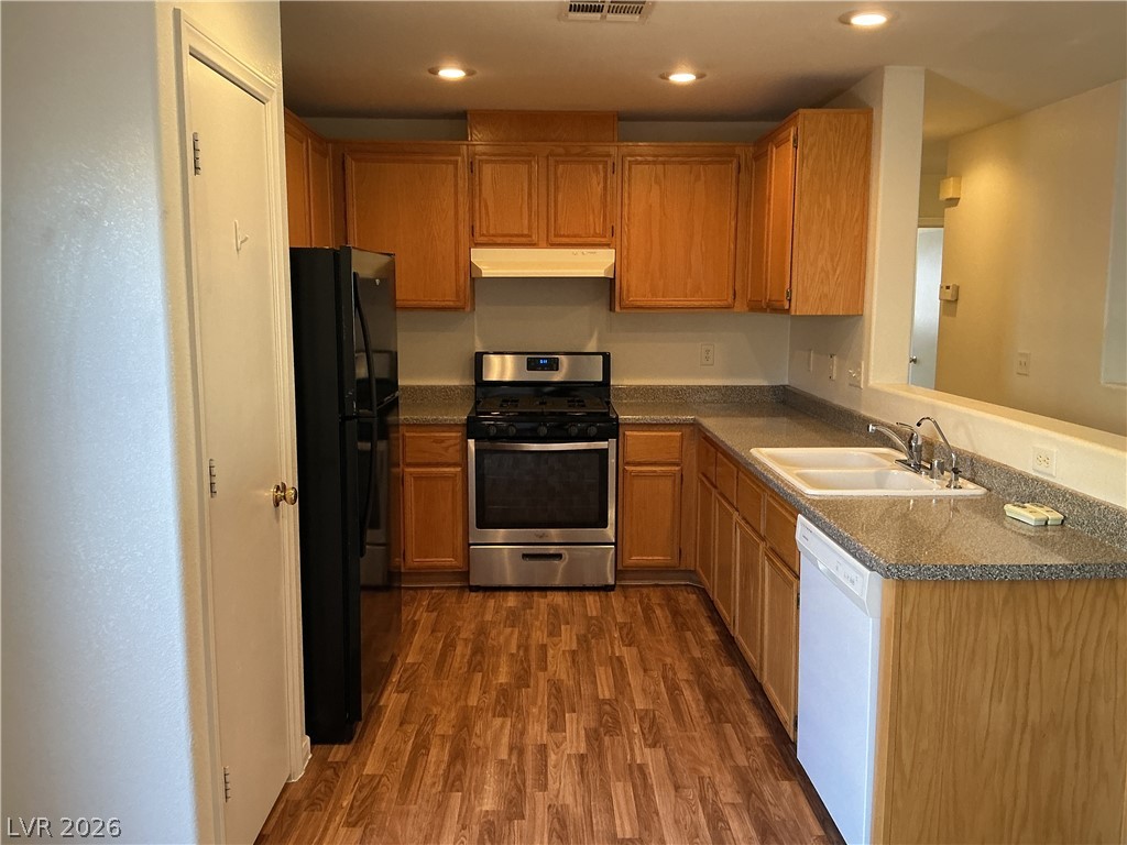 8108 Roundup Ridge Street Las Vegas, NV 89131 - Photo 3 of 21 A well-appointed kitchen features ample cabinetry, durable countertops, and essential appliances.