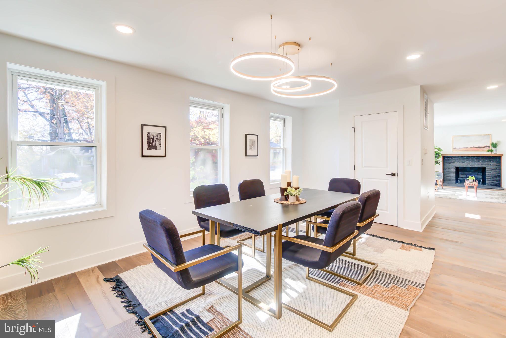 1206 La Grande Road Silver Spring, MD 20903 - Photo 12 of 45 a view of a dining room with furniture and a large window