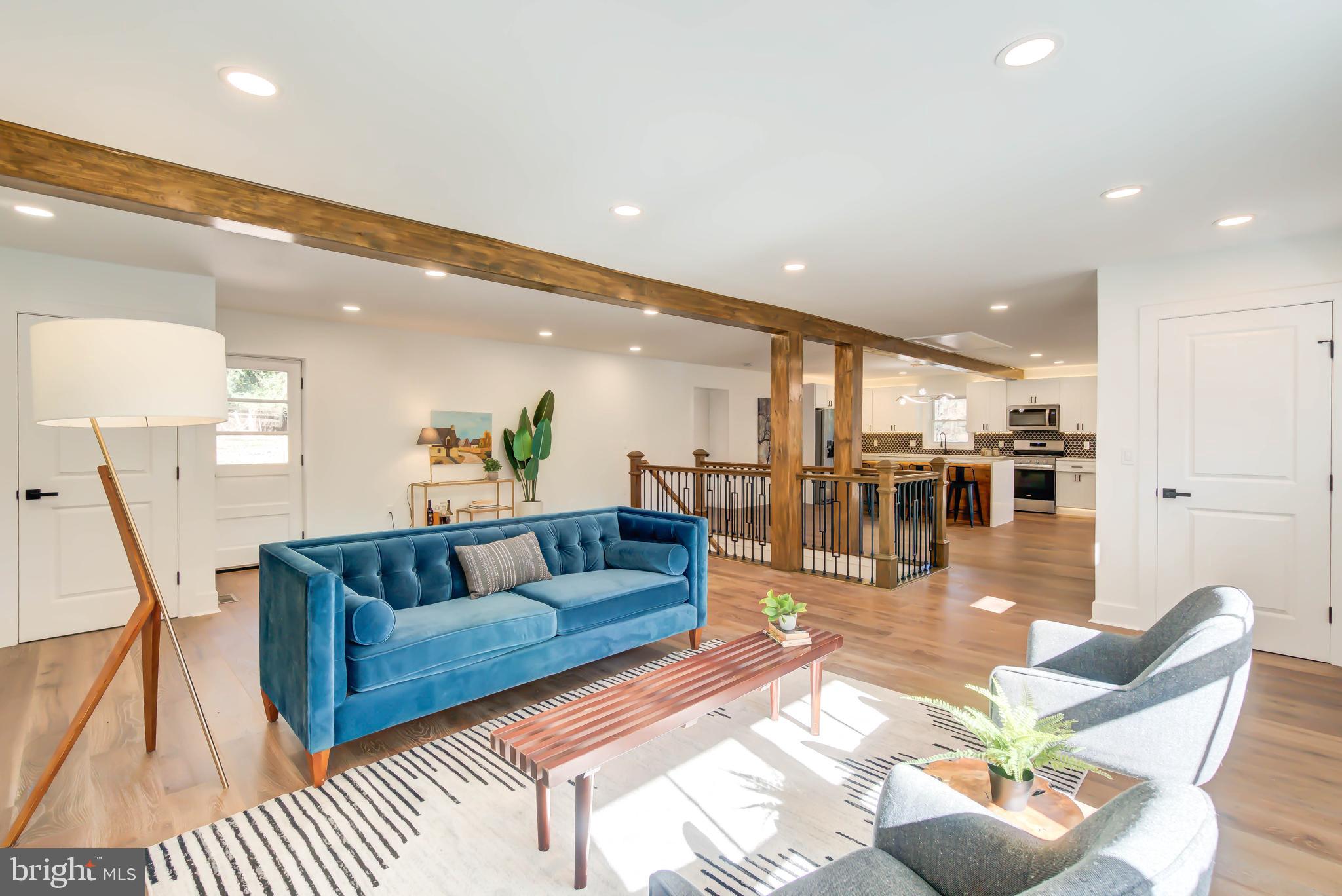 1206 La Grande Road Silver Spring, MD 20903 - Photo 2 of 45 a living room with furniture and kitchen view