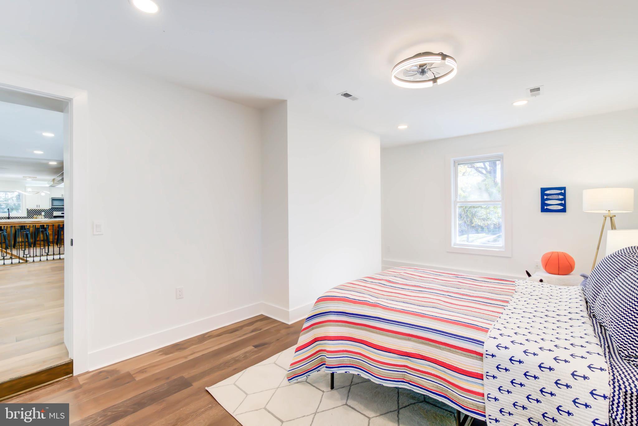 1206 La Grande Road Silver Spring, MD 20903 - Photo 21 of 45 a bedroom with a bed and window