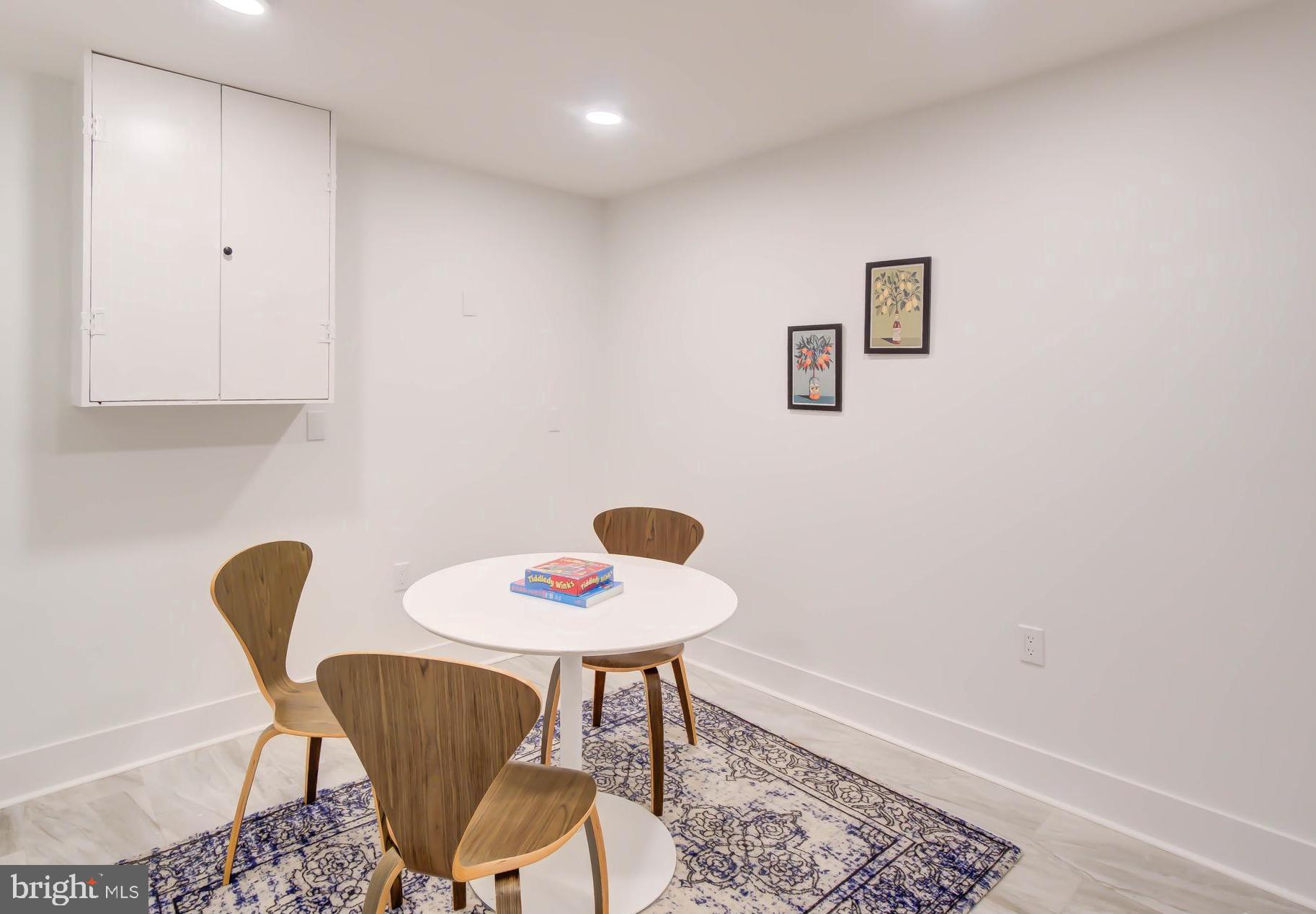 1206 La Grande Road Silver Spring, MD 20903 - Photo 29 of 45 a view of a workspace with furniture