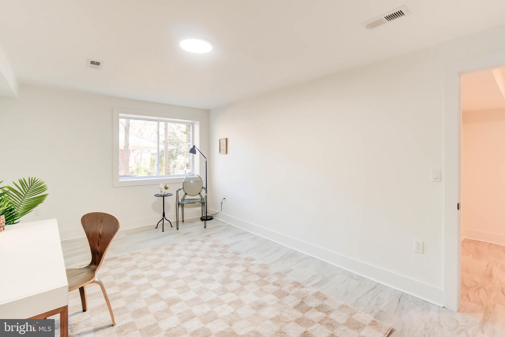 1206 La Grande Road Silver Spring, MD 20903 - Photo 31 of 45 a view of an empty room with a window