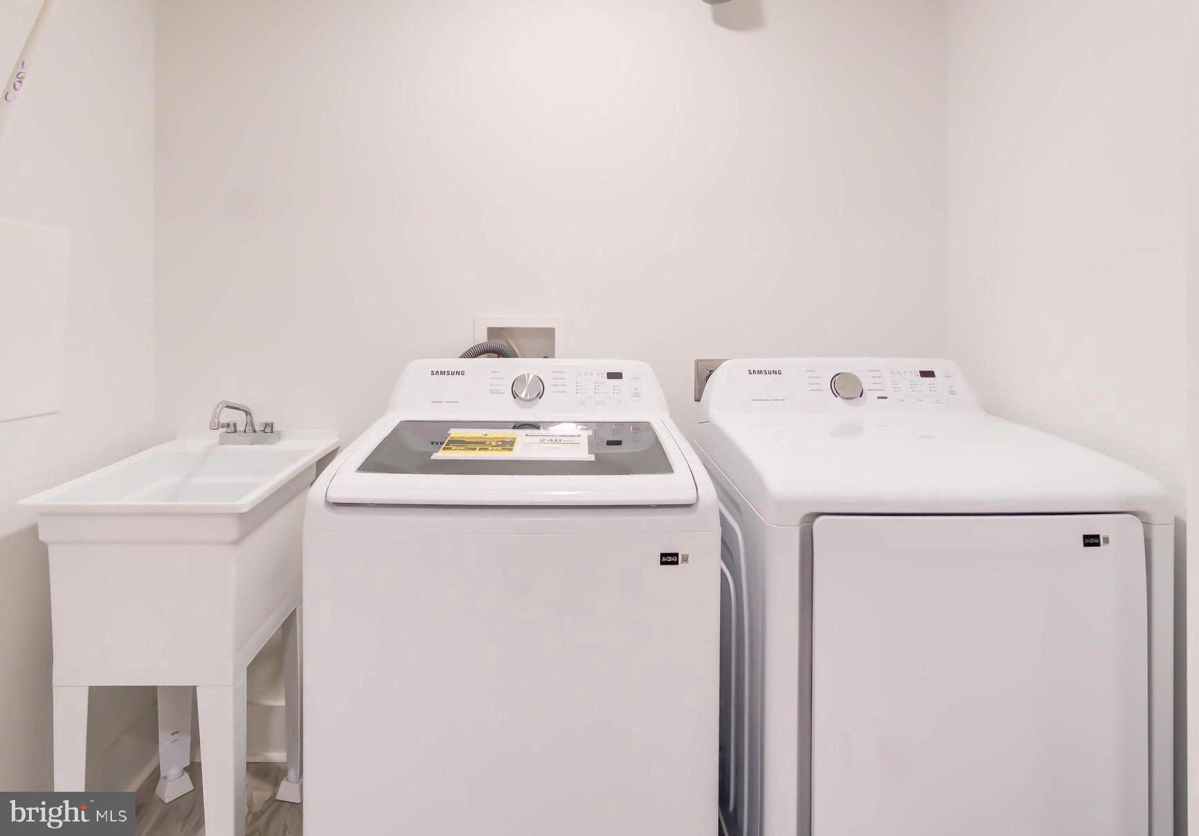 1206 La Grande Road Silver Spring, MD 20903 - Photo 34 of 45 a utility room with dryer and washer