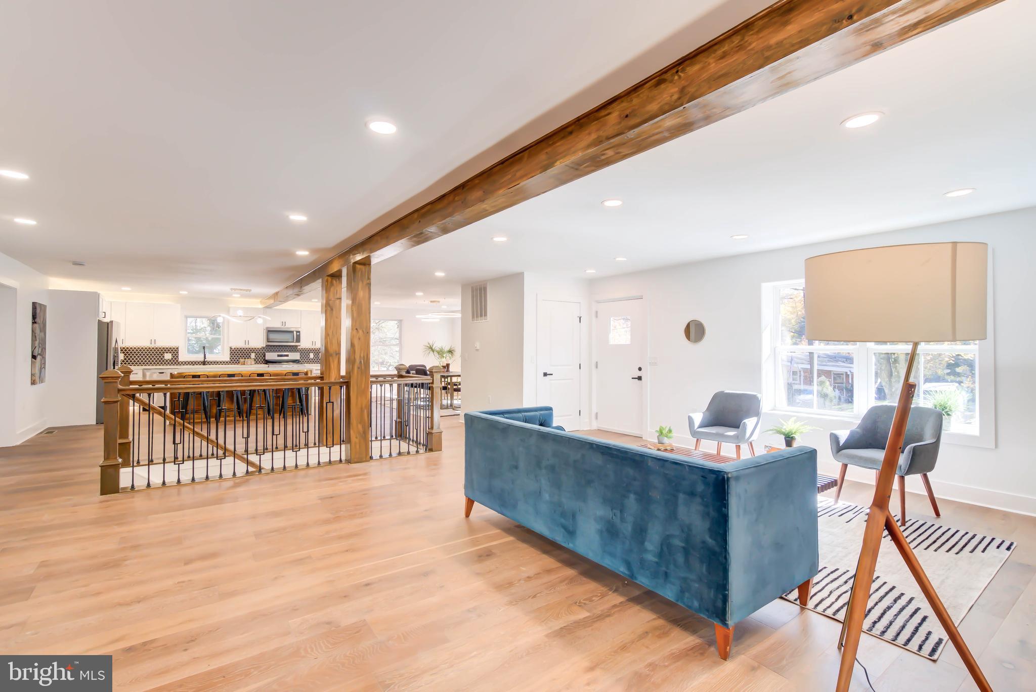 1206 La Grande Road Silver Spring, MD 20903 - Photo 5 of 45 a living room with furniture and a table