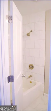 a bathroom with a bathtub