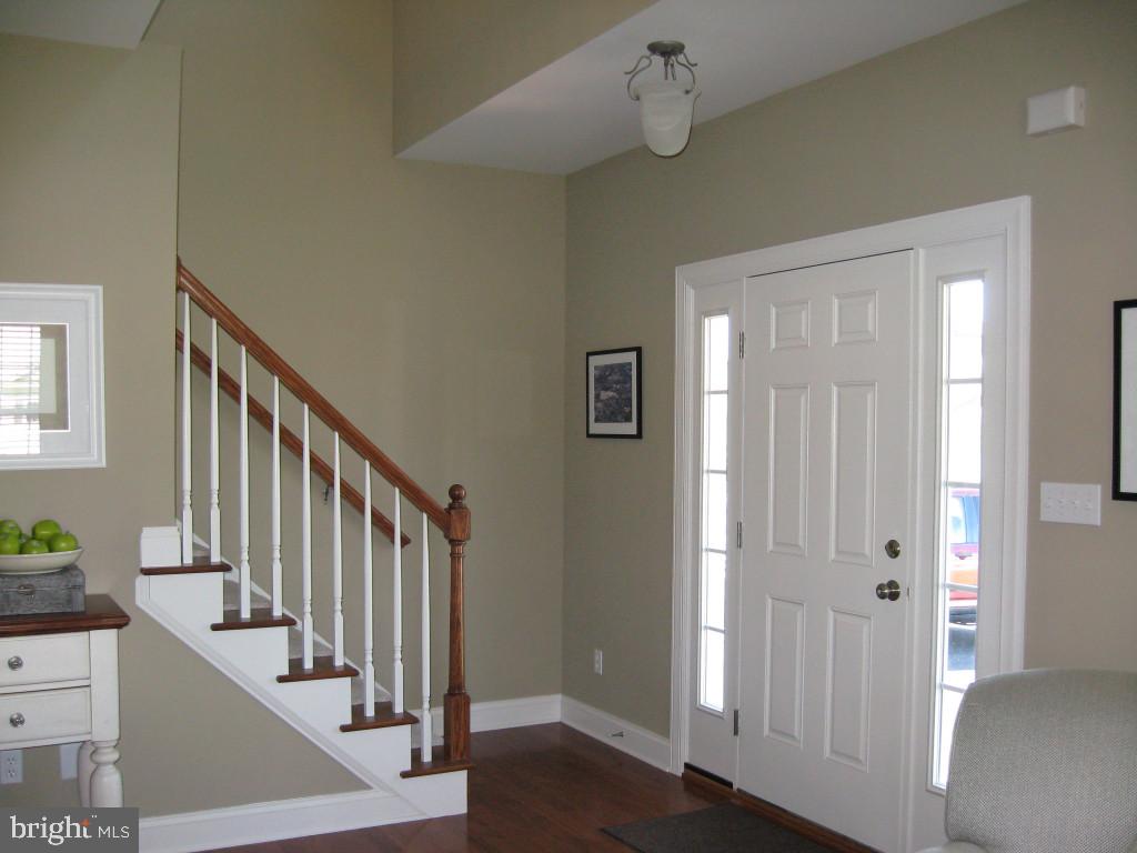 139 Baneberry Lane, Unit 15 Lititz, PA 17543 - Photo 6 of 9 a view of an entryway with wooden floor