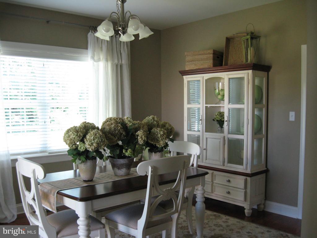 139 Baneberry Lane, Unit 15 Lititz, PA 17543 - Photo 7 of 9 a dining room with furniture and window